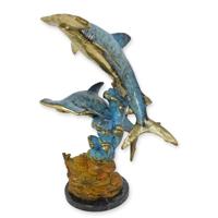 A BRONZE SCULPTURE OF A PAIR OF HAMMERHEAD SHARKS A BRONZE SCULPTURE OF A PAIR OF HAMMERHEAD SHARKS