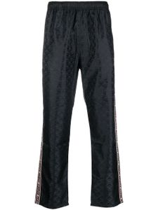 Diesel pantalon de jogging à logo en jacquard - Noir