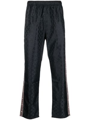 Diesel pantalon de jogging à logo en jacquard - Noir
