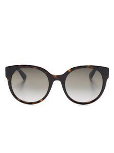 Gucci Eyewear lunettes de soleil à plaque logo GG - Marron