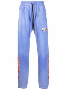 AMIRI pantalon de jogging à flammes brodées - Bleu