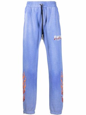AMIRI pantalon de jogging à flammes brodées - Bleu
