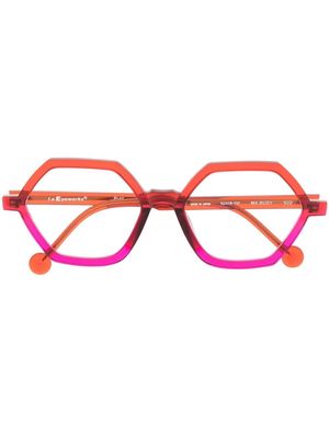 L.A. EYEWORKS lunettes de vue géométriques à design transparent - Rouge