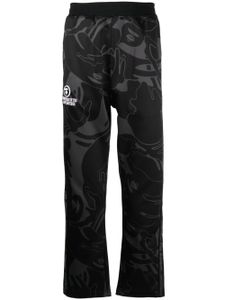 AAPE BY *A BATHING APE® pantalon imprimé à patch logo - Noir