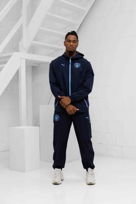 Manchester City Tech Woven Trainingspak Senior 2025/2026 Donkerblauw - Maat M - Kleur: DonkerblauwLichtblauw | Soccerfanshop