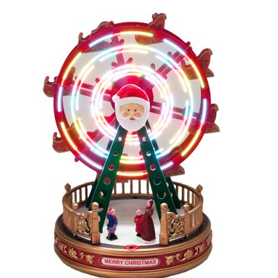 Kerstdorp kerst tafereel - reuzenrad - met beweging en led verlichting - 28 cm - kermis