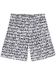 VETEMENTS short en coton à logo imprimé - Blanc