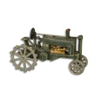 A CAST IRON MODEL OF A TRACTOR