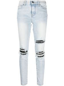 AMIRI jean skinny MX1 à effet usé - Bleu