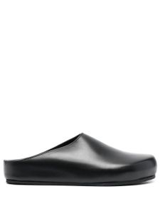 Studio Nicholson mules en cuir - Noir