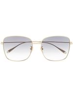 Gucci Eyewear lunettes de soleil Charms à monture oversize - Or