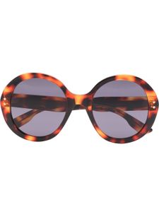 Gucci Eyewear lunettes de soleil à effet écaille de tortue - Marron