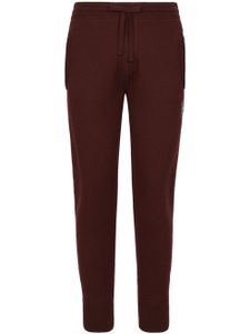 Dolce & Gabbana pantalon de jogging à plaque logo - Marron