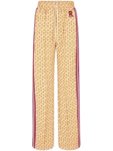 Rabanne pantalon de jogging à motif monogrammé - Jaune