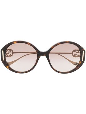 Gucci Eyewear lunettes de soleil à monture ovale - Marron