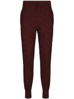 Dolce & Gabbana pantalon de jogging en soie à motif en jacquard - Rouge