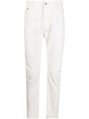 Brunello Cucinelli jean à effet délavé - Blanc