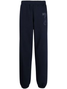 Moschino pantalon à logo imprimé - Bleu