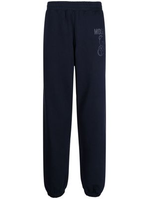 Moschino pantalon de jogging à logo imprimé - Bleu