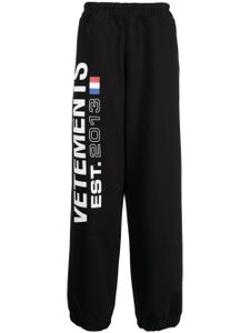 VETEMENTS pantalon de jogging à logo imprimé - Noir