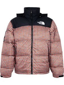 Supreme x The North Face veste à détails de clous - Rouge