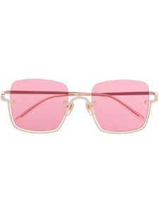 Gucci Eyewear lunettes de soleil teintées à monture oversize - Or