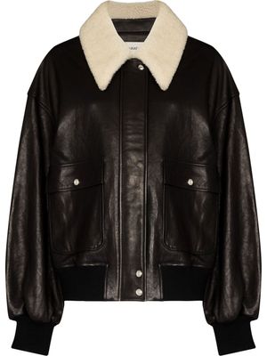 KHAITE veste en cuir à col lainé - Noir