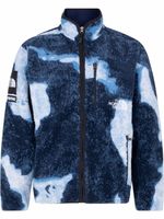 Supreme x TNF veste en jean à effet délavé - Bleu