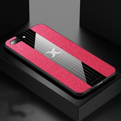 Voor OPPO R11 XINLI stiksels doek Textue schokbestendig TPU beschermhoes (rood)