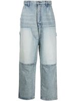 AMBUSH jean évasé à design à empiècements - Bleu