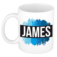 Naam cadeau mok / beker James met blauwe verfstrepen 300 ml