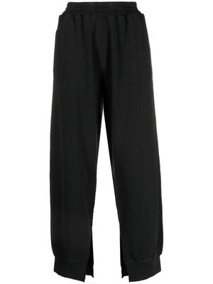 MM6 Maison Margiela pantalon de jogging à détails de fentes cousues - Noir