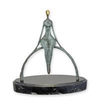 A BRONZE SCULPTURE OF A MODERN MAN SITTING ON A BOW
