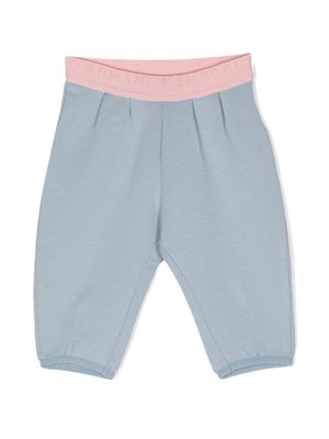 Emporio Armani Kids pantalon de jogging fuselé à taille à logo - Bleu