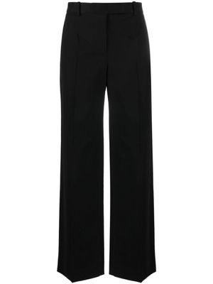 The Row pantalon en coton mélangé à coupe ample - Noir