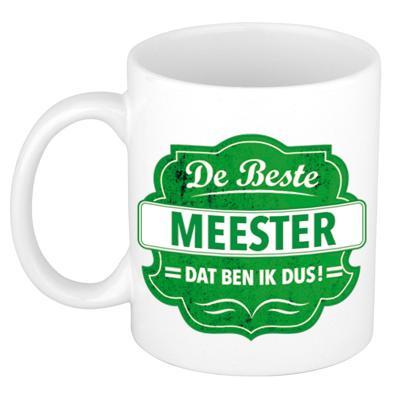 Bellatio Decorations De beste meester koffiemok - cadeau beker - wit - groen embleem - 300 ml