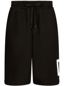 Dolce & Gabbana short de sport à logo imprimé - Noir