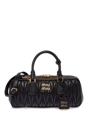 Miu Miu sac à bandoulière à design matelassé - Noir