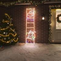 VidaXL Kerstfiguur kerstman op ladder opvouwbaar 552 led&apos;s 50x200 cm