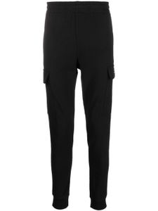 Ea7 Emporio Armani pantalon de jogging en coton à coupe fuselée - Noir