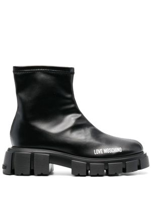Love Moschino bottes à logo imprimé 50 mm - Noir