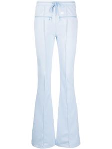 Courrèges pantalon de jogging à coupe évasée - Bleu