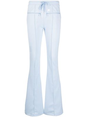 Courrèges pantalon de jogging à coupe évasée - Bleu