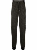 Balmain pantalon de jogging à imprimé monogrammé - Marron