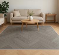 Woodward taupe visgraatpatroon vinyl tapijt woonkamer