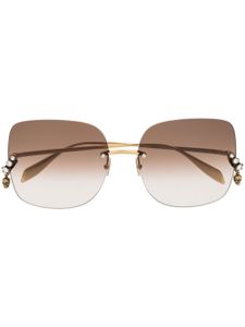 Alexander McQueen Eyewear lunettes de soleil AM0390S à monture carrée - Or