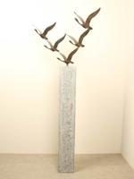 5 bronzen zwanen