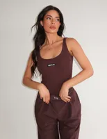 Unique The Label Jill Bodysuit Dames Donkerbruin - Maat XS - Kleur: Donkerbruin | Soccerfanshop