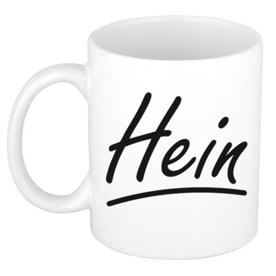 Hein Naam koffiemok - beker - met sierlijke letters - wit - 300 ml - Cadeau - Heren Hein Naam koffiemok - beker - met sierlijke letters - wit - 300 ml - Cadeau - Heren