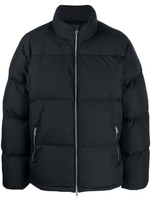 Stüssy doudoune à logo brodé - Noir